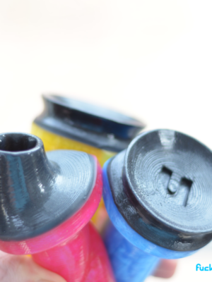 NoFrillDo bases with black frills attached, a suction cup and a bullet vibe slot.